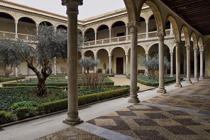 The two-storey cloister of San Juan de los Reyes in Toledo with olive trees in the garth