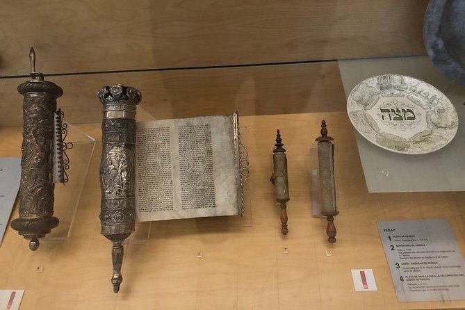 A Torah scroll and its silver case in a display cabinet in Toledo's Sephardic Museum